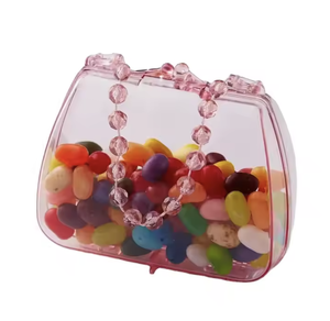 Kwang Hsieh Mini caja de dulces con forma de bolso translúcido rosa - Product Image 1