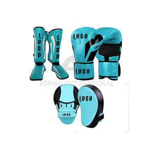 Compre guantes de boxeo personalizados con logotipo personalizado Guantes de boxeo de repuesto de entrenamiento de cuero de vaca dorado Juego de espinilleras con almohadilla de enfoque - Product Image 1