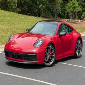Coupé Carrera 4S AWD 2024 d'occasion en excellent état, extérieur rouge carmin, intérieur gris, faible kilométrage, transmission intégrale, moteur 443 - Product Image 1