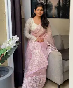 Elegant Fashionable Georgette Saree Adorned with Artistic Hand Work and Graceful Tussle Accents for Formal Events - Product Image 1