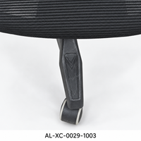 Chaise de bureau moderne noire à cadre creux en maille avec appui-tête et assise en maille ouverte pour bureaux de direction et espaces de travail à domicile