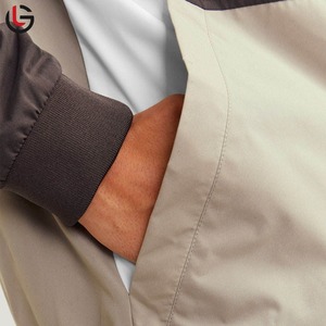 Veste coupe-vent confortable pour homme en polyester, col montant, imperméable, style décontracté, logo frontal, service OEM pour l'hiver - Product Image 5
