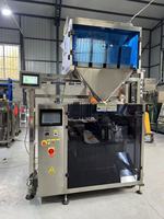 Machine de remplissage et d'emballage automatique de sachets Doypack à fermeture éclair, prix économique pour les sachets préformés en plastique, les graines, les assaisonnements