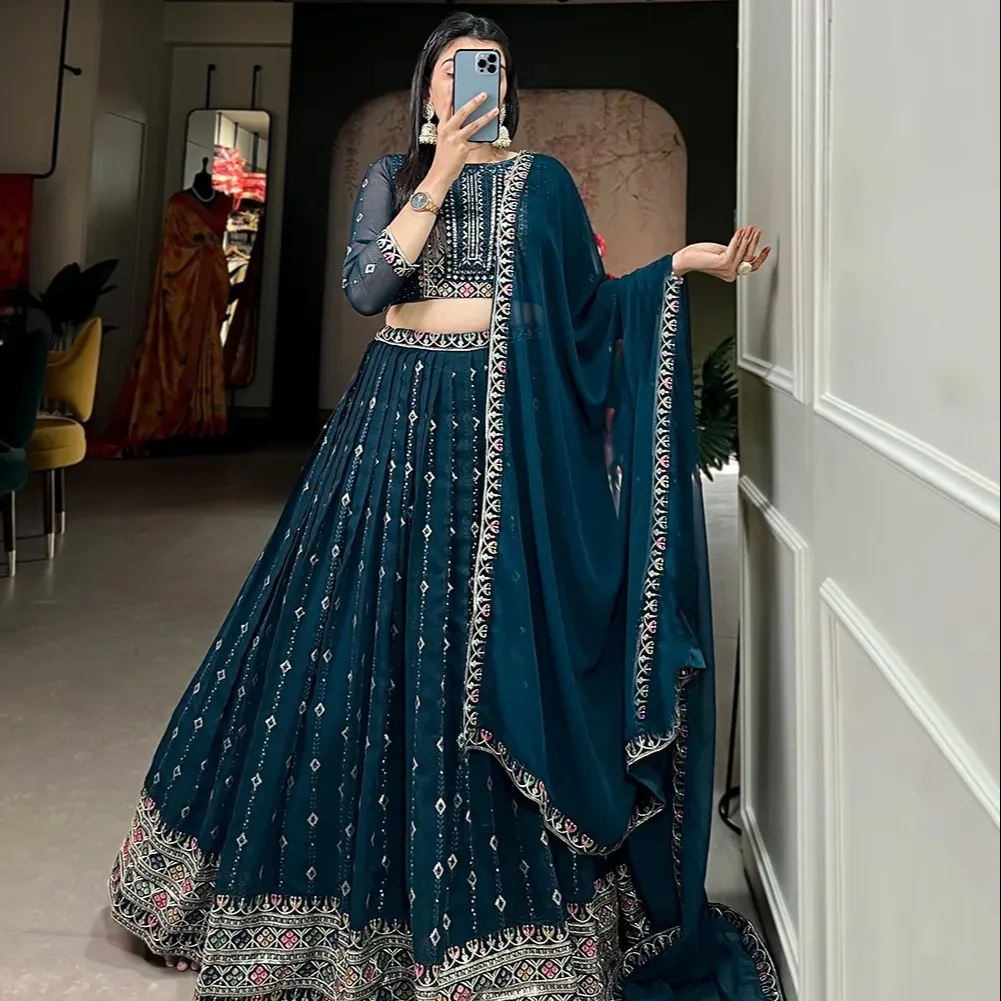 A step into festivities adorned in this embroidered lehenga choli, carry the weight of tradition and the buoyancy of modernity