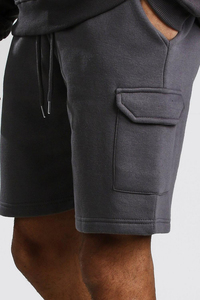 Pantalones cortos de chándal de forro polar técnico de gran tamaño para hombre con logotipo personalizado OEM, pantalones cortos de chándal personalizados de algodón 100%, bolsillo de carga, calidad superior sólida - Product Image 3