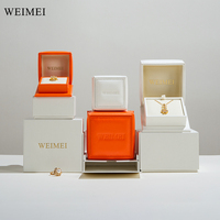 Boîte d'emballage pour bijoux en cuir carrée orange et blanche de haute qualité avec logo personnalisé WEIMEI, nouvelle conception, avec boîte extérieure en papier