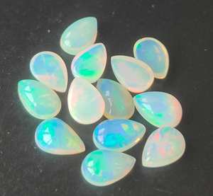 Ópalo etíope natural multicolor multifuego 3x4mm-8x12mm pera cabujón parte posterior plana suelta alta calidad fabricación de joyas de piedras preciosas - Product Image 1