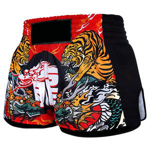 กางเกงมวยไทยขายส่ง สำหรับฝึกศิลปะการต่อสู้ มวยไทย คิกบ็อกซิ่ง น้ำหนักเบา ยืดหยุ่น แห้งเร็ว ระบายอากาศได้ดี 男女兼用 100% - Product Image 2