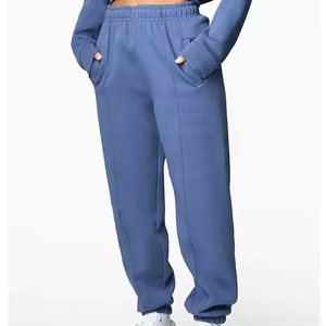2025 pantalones de chándal para correr de alta calidad para mujer con bolsillos laterales informales de cintura media elásticos y ajustables - Product Image 1