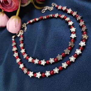 Tobillera de cuentas de mal de ojo asequible para fiesta para niñas cuentas negras con diseño de estrella de mal de ojo azul tobillera de cuentas negras Payal - Product Image 1