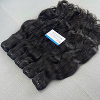 Top couleur jetblack extension de cheveux humains vietnamiens texture ondulée naturelle prête à expédier cheveux trame machine