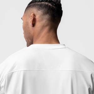 Camiseta de entrenamiento de gran tamaño blanca Camiseta de gimnasio de rendimiento Absorbe el sudor, antimicrobiano, camiseta de entrenamiento atlético Boxy Fit de secado rápido - Product Image 4