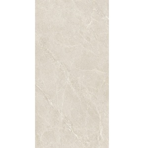Cyprus Marfil กระเบื้องพอร์ซเลนขัดเงาระดับพรีเมียม F2 60x120ซม. พื้นผิวทนทานและการออกแบบที่หรูหราสำหรับพื้นและผนังที่ทันสมัย - Product Image 1
