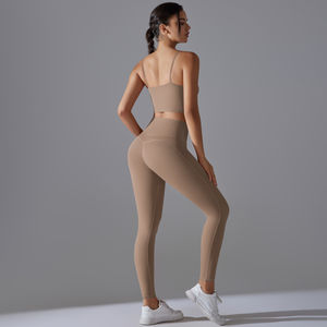 Venta al por mayor de logotipo personalizado sin costuras sólido elástico Yoga conjunto sujetador Legging correr de dos piezas gimnasio Fitness conjuntos ropa para mujer - Product Image 4