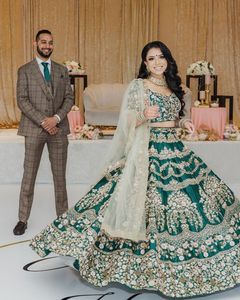 TRENDY & BEAUTIFUL HEAVY EMBROIDERY on BOTTLE GREEN <b>BLOUSE</b> ,LEHENGA WITH STYLISH MEN TUXEDO SUITS for GROOM @ 2024 - Product Image 1