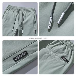 Custom OEM Winter Smart Tight Formal Woolen Fabric <b>Elastic</b> Waist Tassel Quick Drying Sports <b>Trousers</b> for <b>Men</b> - Product Image 2