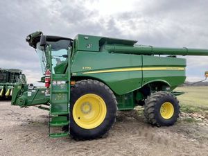 รถแทรกเตอร์สำหรับทำการเกษตร ยี่ห้อ John Deere รุ่น X9 1100 ใช้แล้ว สภาพดี สำหรับเก็บเกี่ยวข้าวโพด ข้าวสาลี ข้าวสาร จากอเมริกา มีขาย - Product Image 4