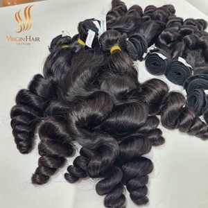 Extensiones de cabello humano vietnamita crudo Onda suelta Doble dibujado Paquetes de cierre brillante muy suave - Product Image 1
