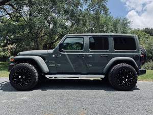 JEEP WRANGLER UNLIMITED SAHARA 4X4 2019 D'OCCASION CÔTÉ GAUCHE/CÔTÉ DROIT - Product Image 2