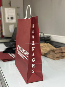 Vente en gros Sacs en papier kraft personnalisés avec poignée torsadée pour l'emballage de cadeaux à emporter avec poignée plate disponible pour - Product Image 2