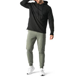 Vente en gros de pantalons de survêtement pour hommes coupe ajustée logo personnalisé pantalon de sport de course à pied privé vêtements de sport sur piste grande taille pantalons en coton pour hommes - Product Image 1