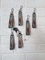 Vente en gros, nouveauté, porte-clés en cuir usiné à la main, véritable poignet en cuir véritable, couleur turquoise, porte-clés à la mode