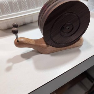 Ensemble de sous-verres en bois sculptés à la main en forme d'escargot avec support, parfaits pour la protection de la table de cuisine à la maison et les occasions spéciales - Product Image 5
