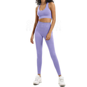 Conjunto de Yoga para mujer de alta calidad sin costuras Spandex poliéster transpirable cintura elástica cierre patrón sólido Venta caliente - Product Image 1