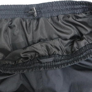 Pantalon coupe-vent brodé personnalisé Pantalon imperméable léger avec options de logo pour l'entraînement, les voyages en plein air et l'usage décontracté - Product Image 4