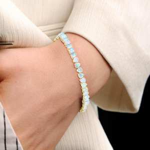 ลูกแพร์สีขาวของเอธิโอเปียตัดเหลี่ยมเพชรพลอยสร้อยข้อมือเทนนิสโอปอล925เงินสเตอร์ลิง14K ชุบทอง ocbirthstone - Product Image 3