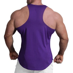 Venta al por mayor de tops deportivos tipo camiseta sin mangas para gimnasio y fitness, de color liso, con bajo curvo y diseño recortado, muy vendidos. - Product Image 3