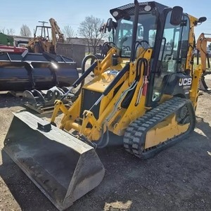 Chargeuse compacte sur chenilles JCB avec godet, équipement de construction jaune - Product Image 1