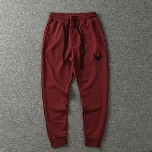 Pantalon de survêtement homme automne 2026 style rétro américain, très élastique, cordon de serrage, imperméable, en maille Oxford imprimée et peinte, 100% coton, sport - Product Image 1