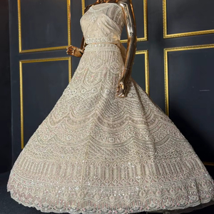 Lehenga choli nupcial verificada, con bordados elaborados, detalles nuevos y un amplio vuelo para eventos especiales - Product Image 1