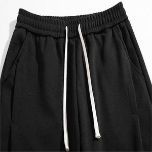 Nuevos Pantalones deportivos informales sueltos de pierna ancha, pantalones de chándal de punto de poliéster para hombres, pantalones lavados para hombres - Product Image 5