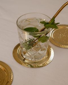 Luxury metal coasters with vintage texture and gold finished for modern home decor - Product Image 1