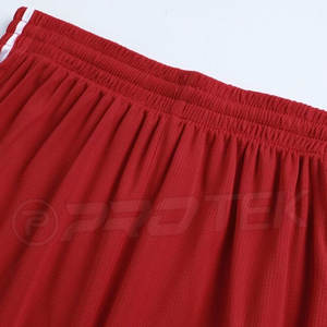 Conjunto de ropa de baloncesto juvenil rojo de alta calidad, transpirable y de talla grande, diseño Reversible simple liso - Product Image 3