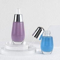 Flacon compte-gouttes en verre blanc nacré en forme d'ampoule Mingsheng de 30 ml et 50 ml pour huile essentielle