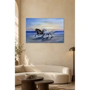 Impression sur toile de chevaux noirs et blancs courant sur la plage par Fida - Product Image 5