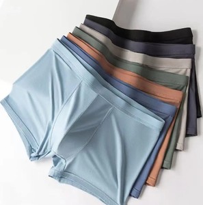 Calzoncillos y bóxer personalizados para hombre, ropa interior desechable sin costuras de LICRA y algodón transpirable, pantalones cortos con logotipo de tela de punto en la cintura - Product Image 1