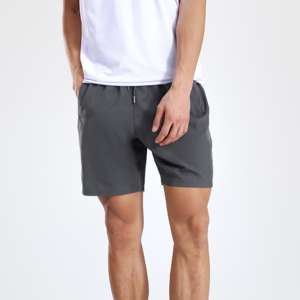 กางเกงขาสั้นออกกำลังกายผู้ชาย 7 นิ้ว แบบสปอร์ต สำหรับวิ่งและฝึกซ้อม แห้งเร็ว มีซิป ขายส่ง ลายเรียบ - Product Image 2