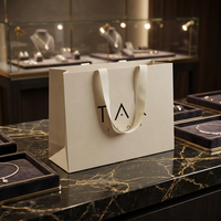 Emballage de bijoux en carton ivoire de luxe avec logo personnalisé, sac de shopping en papier épais pour vêtements