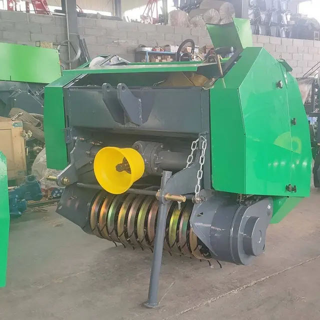 Venta al por mayor Máquina empacadora de heno y paja tractor Mini Máquina empacadora de heno Máquina empacadora redonda de hierba