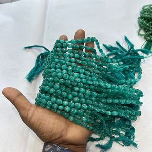 Monalisa ลูกปัดแก้วทรงวงรีสีฟ้าธรรมชาติขนาด7/9มม. พลอยสีเขียวหนึ่งเส้น12นิ้ว - Product Image 3