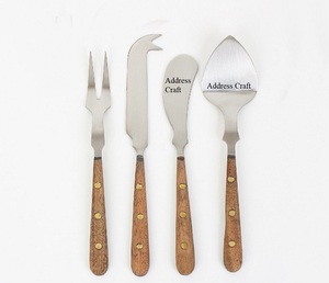 ชุดเครื่องใช้บนโต๊ะอาหารทำจากสเตนเลสสตีลสำหรับตกแต่งคุณภาพสูงชุดเครื่องเงินขัดเงาพร้อมด้ามไม้ชุดสีน้ำตาล4ชิ้น - Product Image 1