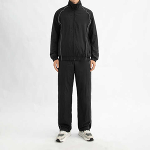 ชุดวอร์มเทคฟลีซผู้ชาย ผ้าไนลอนกันลม แต่งแถบสะท้อนแสง ปักโลโก้ - Product Image 3