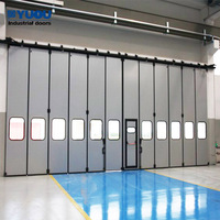 Puerta Industrial Plegable Automática de Acero Resistente con Panel Sándwich Aislante, Impermeable y Ahorro Energético