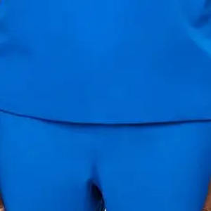 Scrubs pour infirmières hospitalières de qualité supérieure en polyester tricoté disponible dans toutes les couleurs et tailles faciles à porter en gros - Product Image 6