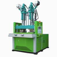 Machine de moulage par injection verticale à disque bicolore, un moule supérieur et deux moules inférieurs, écran tactile PLC intelligent, haute précision