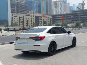 ซีวิค ปี 2023 4.5 ลิตร ซีดาน ขับเคลื่อนสี่ล้อ เกียร์อัตโนมัติ พวงมาลัยซ้าย 400 แรงม้า เครื่องยนต์เบนซินธรรมดา เบาะหนัง ภายในสีเข้ม หลังคาซันรูฟแบบพาโนรามา 360 องศา - Product Image 4